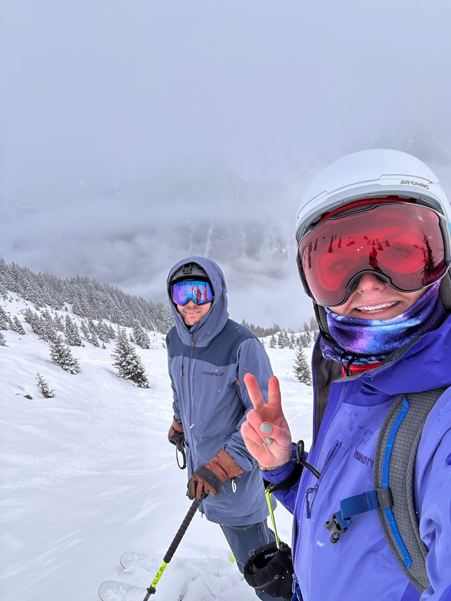 Selfie mid-tour — goggles on, big grins